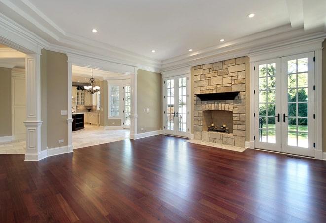 natural light highlights the grain of the hardwood flooring